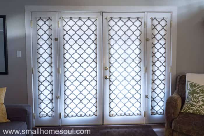 Simple french door curtains hung after sewing.