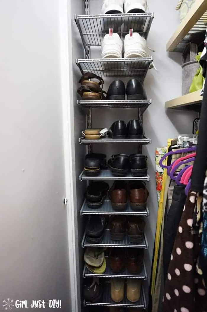Shoes on vertical shelves added during closet makeover.