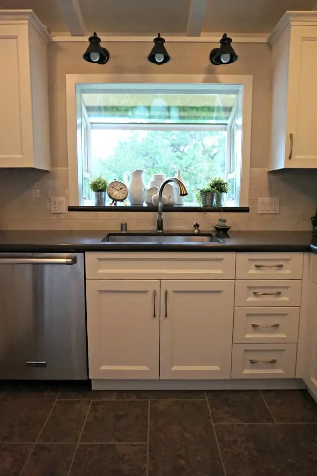 Kitchen Renovation completed showing new kitchen sink and garden window.