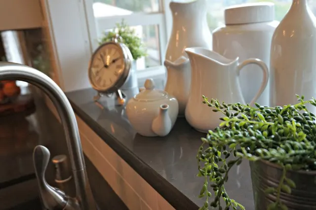 Kitchen Renovation completed, greenery on deck of garden Window.