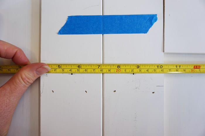 Ruler measuring center of trim boards