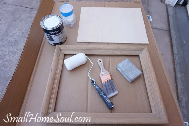 Paint roller and brush with chalkboard paint to make your Easy DIY Chalkboard from a Picture Frame.