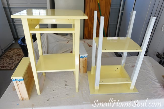 Hacked Ikea Nightstands with buttery yellow paint and new drawer pulls that play off the comforter - www.smallhomesoul.com