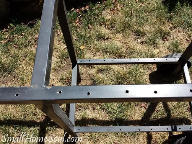 Holes drilled in patio cart for attaching redwood.