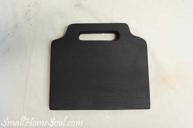 Black painted board for the mason jar utensil caddy.
