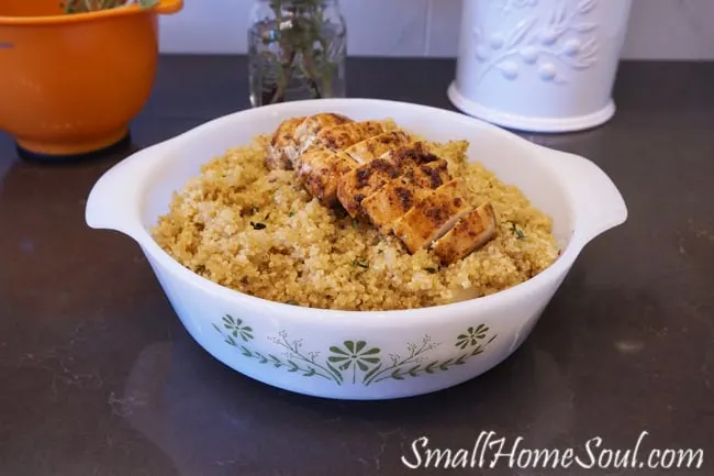 Savory quinoa and chicken dish in a pyrex serving bowl.
