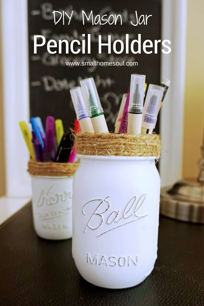 Mason jar pencil holders in front of chalkboard