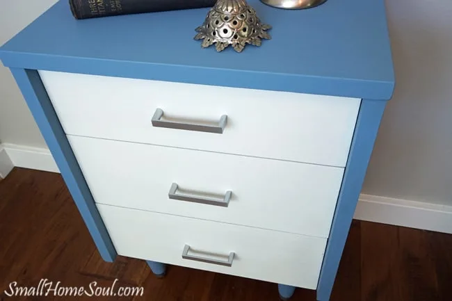 Top view of completed mid-century modern dresser in blue and white.