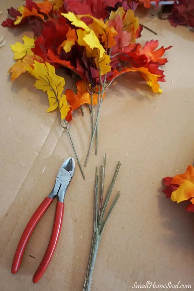 Faux maple leaf stems and wire cutters.