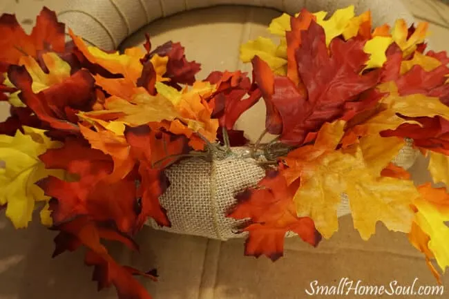 Maple leaf faux stems glued into wreath form.