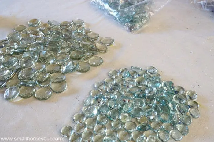 sorting dollar store beads for glass backsplash.