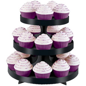 Black cardboard cupcake stand with purple cupcakes.