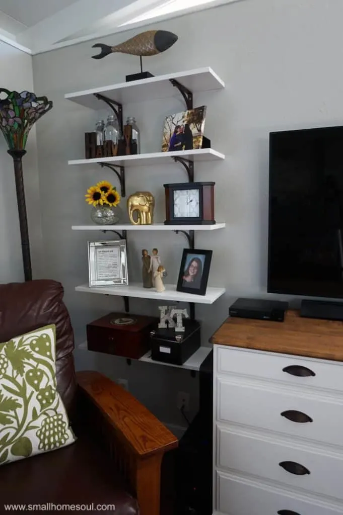 One set of shelves to the left of the TV