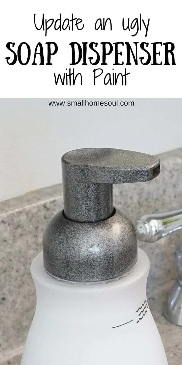 Closeup of foaming soap dispenser spray painted with metallic look