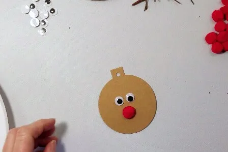 Rudolph Gift Tags with googly eyes and red pompom nose.