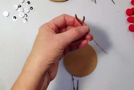 Adding twig ears to the Rudolph Gift Tags