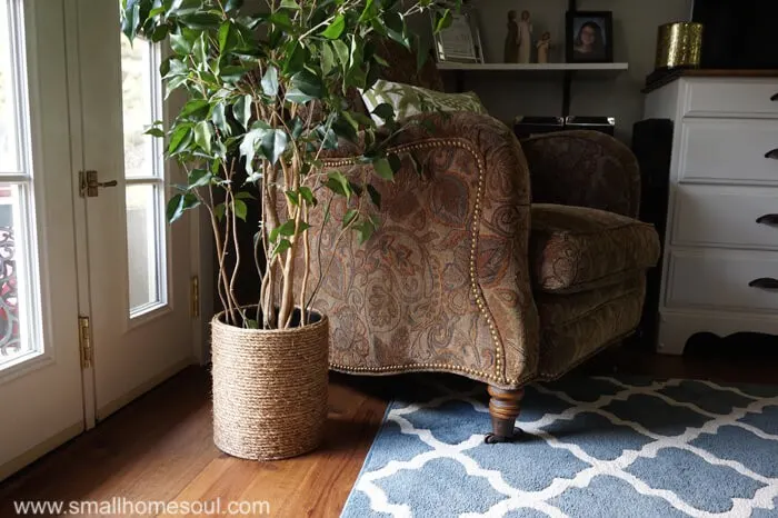 Rope Planter Basket by the window with a houseplant.