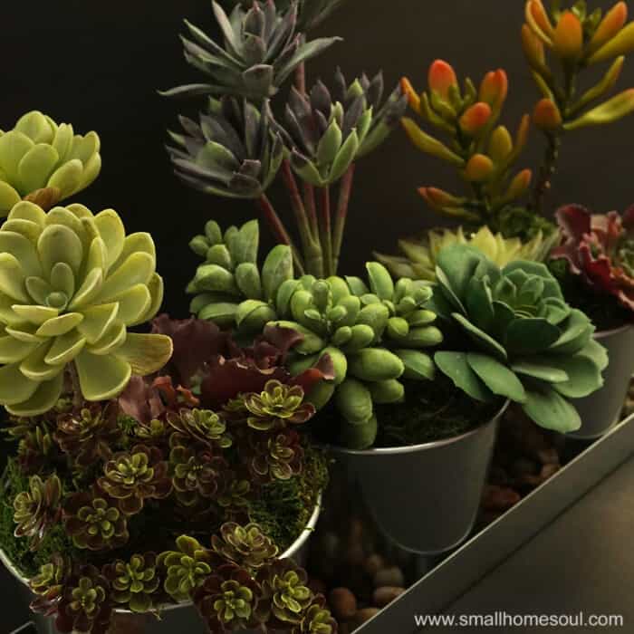 This faux succulent planter is so beautiful in galvanized pots.