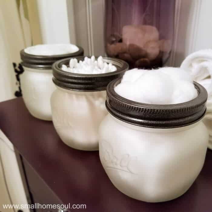 Use etching cream to make a beautiful mason jar bathroom organizer. Beautiful for any bathroom decor or style.
