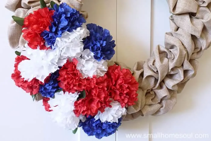Bunches of carnations make the July 4th Wreath pop.