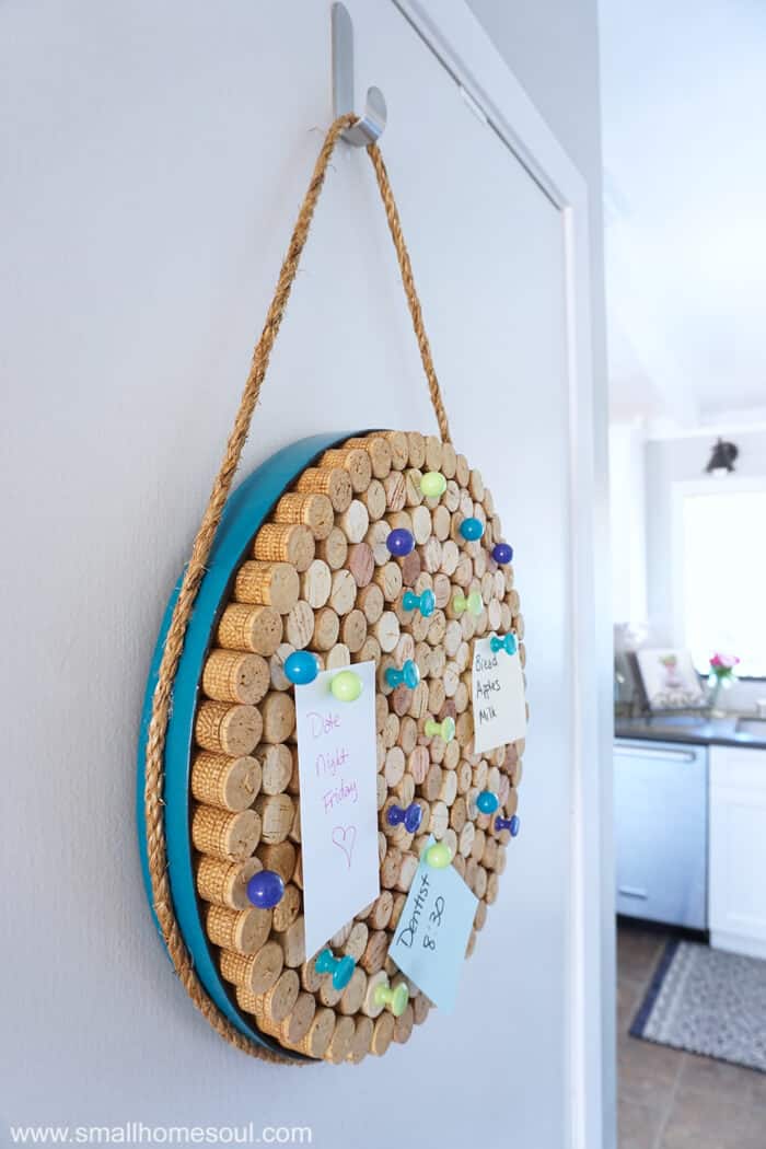 DIY Wine Cork Board hung in kitchen entry.