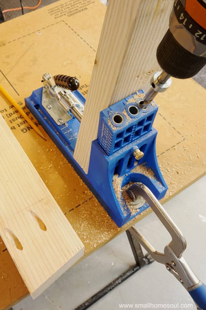 Kreg Pocket Hole Jig clamped to work table and cordless drill