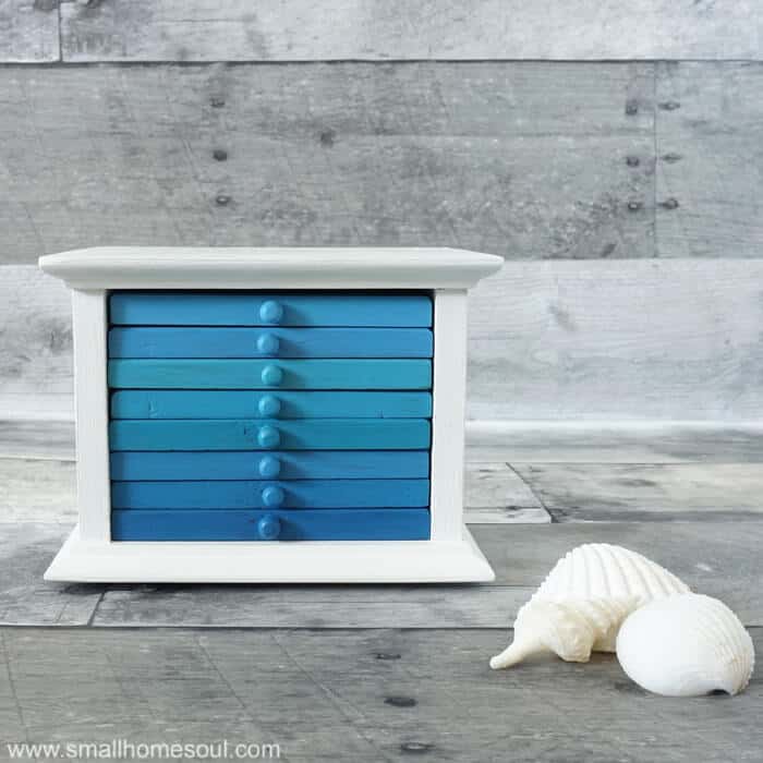 This coastal drink coaster makeover is almost too pretty to use. It will look great in any living room.