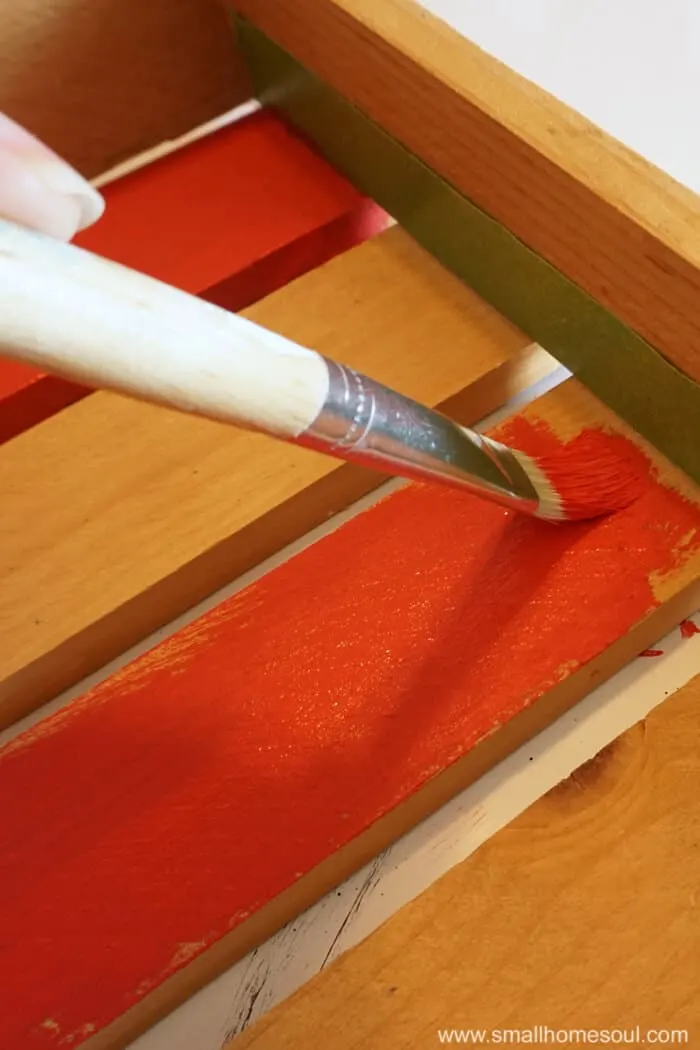 Painting red stripes on July 4th star tray.