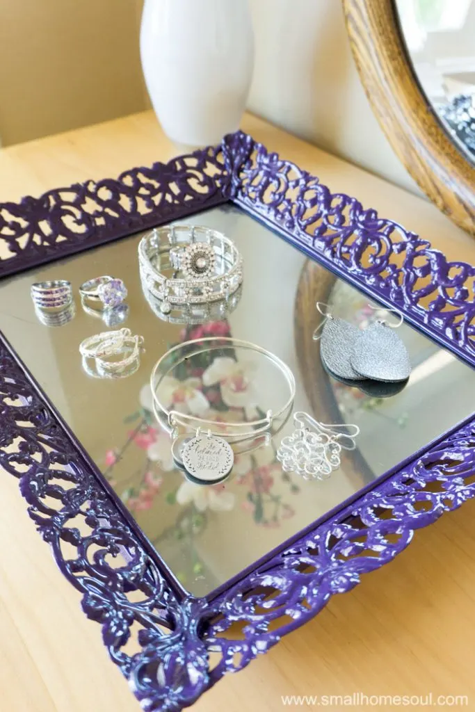 Jewelry tray loaded with shiny jewelry.