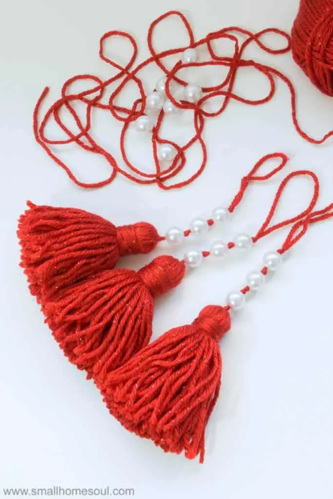 Finished Red Christmas Tassel Ornament with white pearls