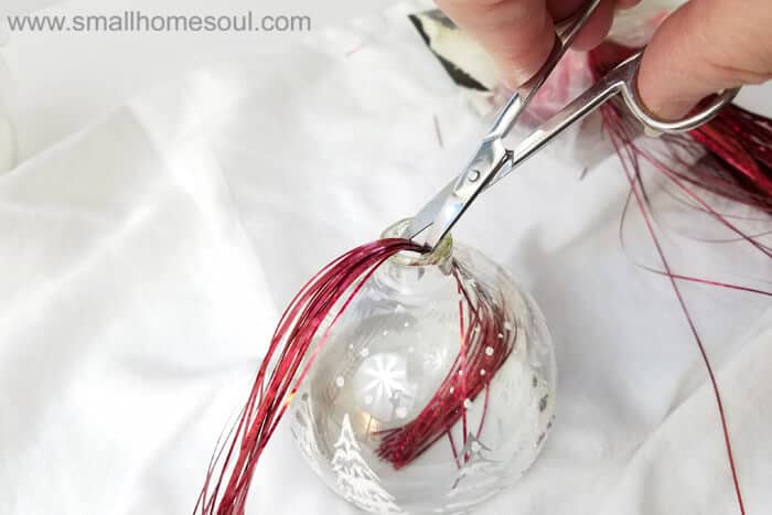 Easy ornament updates with tinsel and scissors