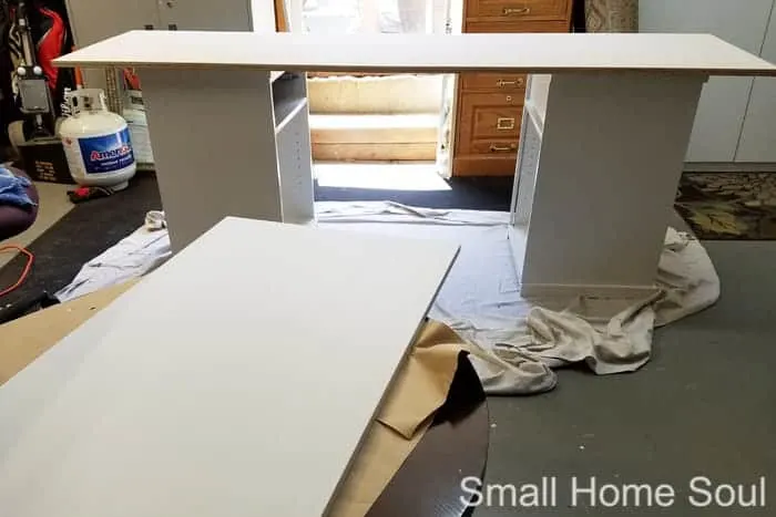 Tops of DIY L Shaped Desk getting painted.