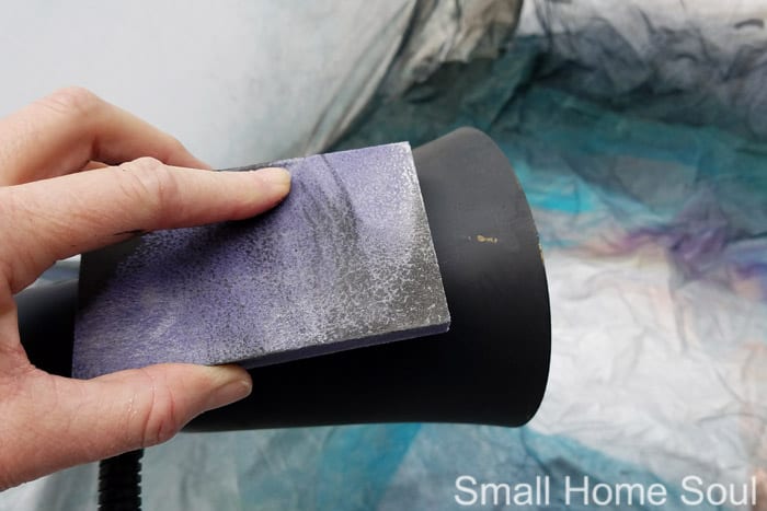 Prepare for desk lamp makeover by scuffing surface.