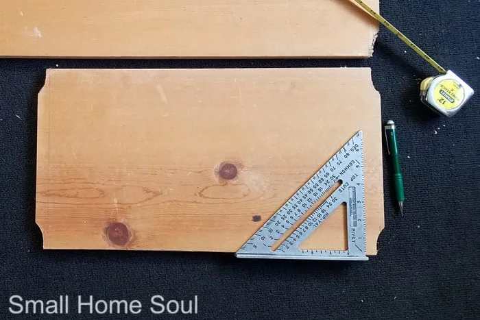 Carpenter's square measuring wood board for cutting to size.box bottom.