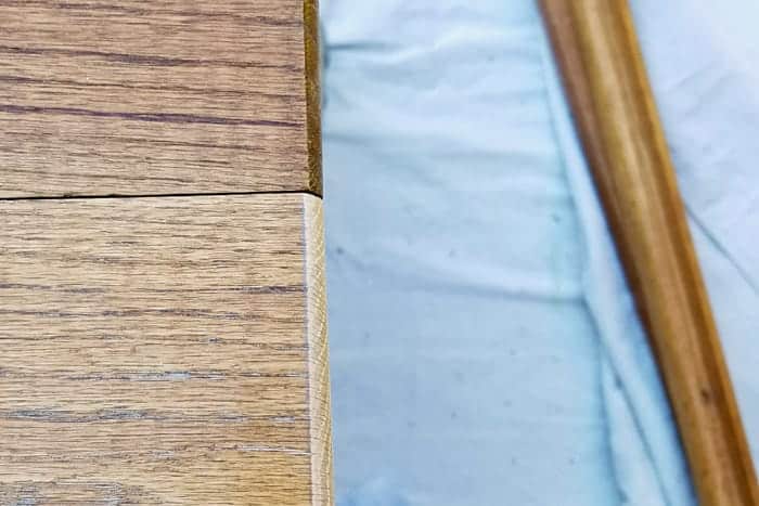 Sanded edges of the floating wood shelves.