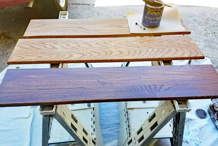 Staining floating wood shelves.