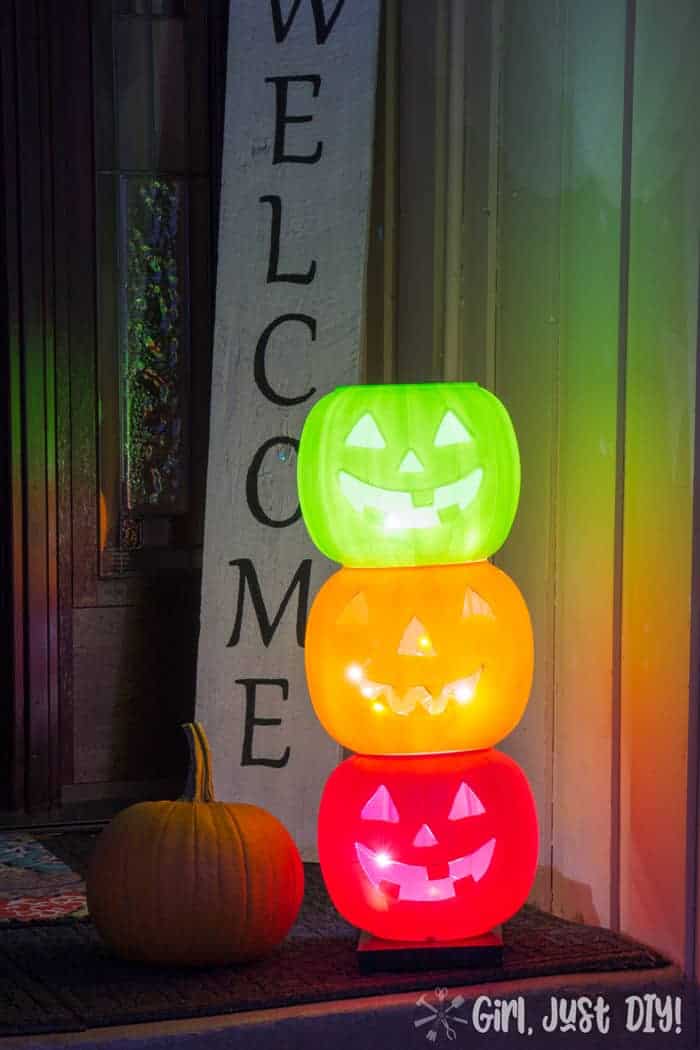 Lit on porch Light up Pumpkins.