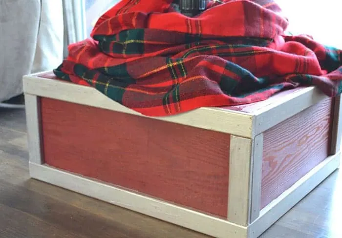 Red and white wooden Christmas tree stand