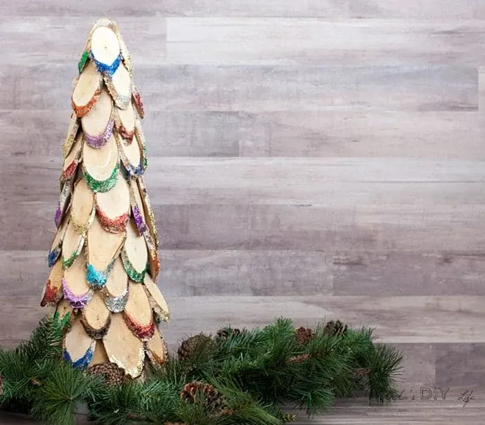 Wood slice Christmas tree with colorful glitter