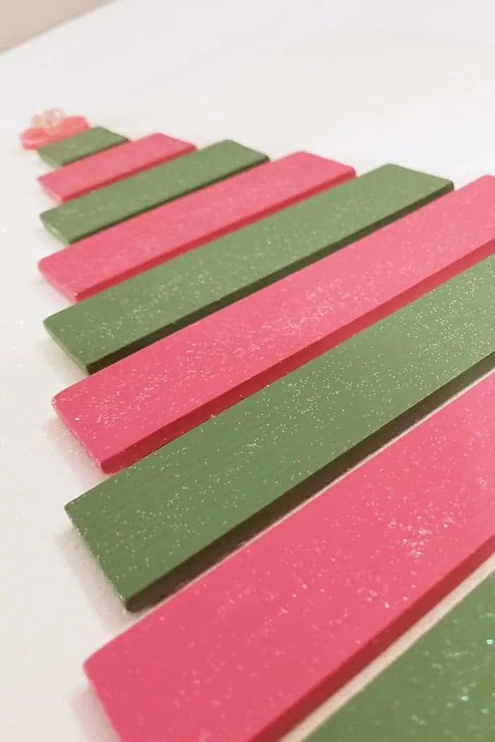 Pink and Green Christmas tree craft with glitter.