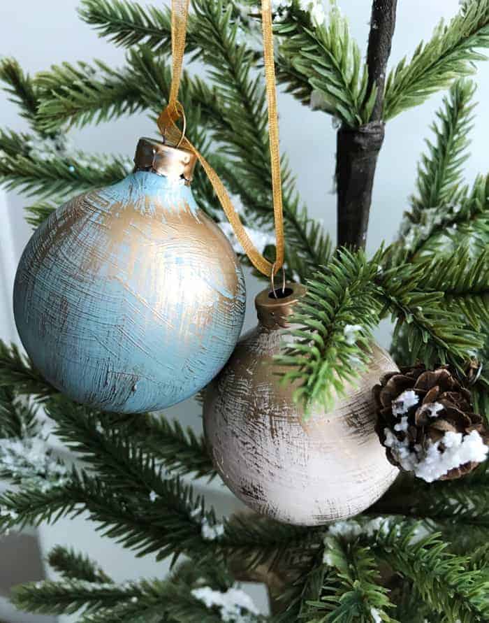 blue DIY Christmas Ornaments with gold dry brushed paint.