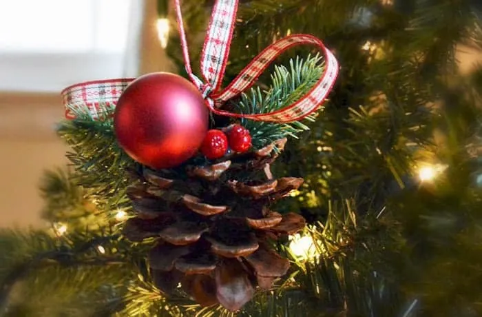 Pinecone ornament with red bulb and berries DIY Christmas Ornament