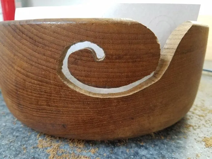 Rough cut swoop in wood bowl.