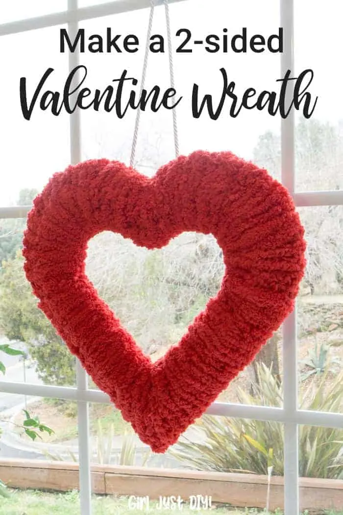 Pinterest image of Double-sided fluffy valentine wreath hung in window.