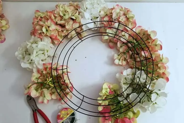Wire wreath half filled with silk hydrangeas