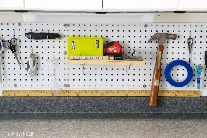 Installed Pegboard shelf with tools on top.