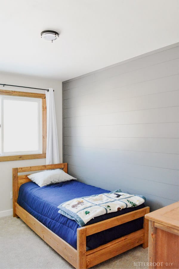 Shiplap bedroom wall painted gray in Household DIY Projects.