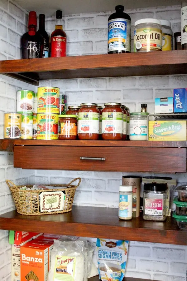 Kitchen Pantry Shelves styled with food and added in Household DIY Projects.