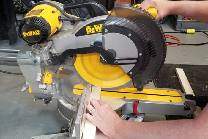 1" x 2" Boards being cut at the miter saw.