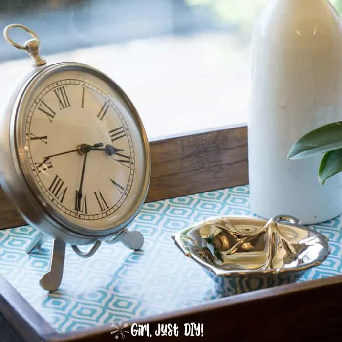 Clock and metal leaf on tray after fast wooden tray update.